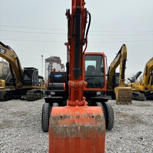 Original Used Doosan DX150W-9C Wheeled Excavator for Urban Road and Utility Wo...